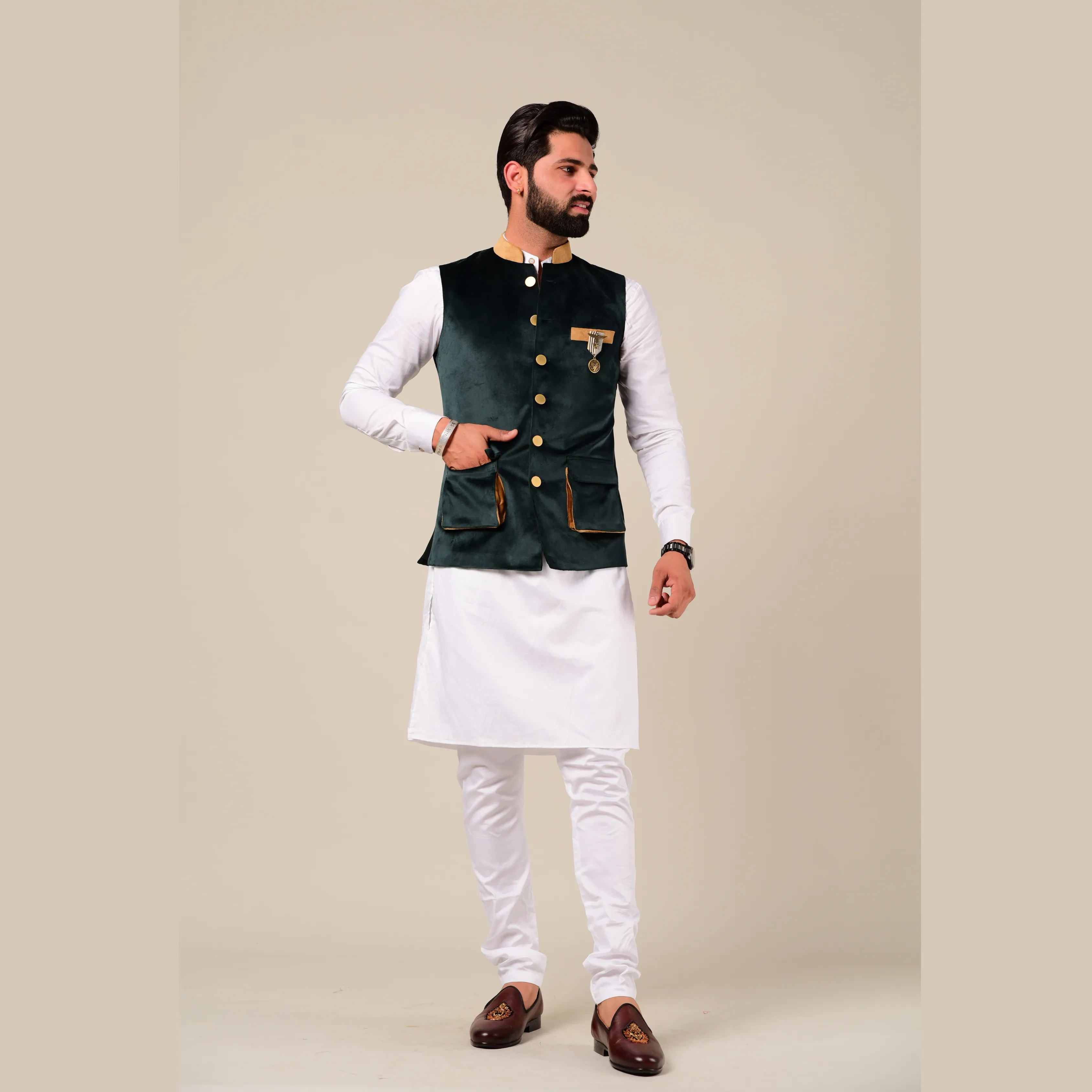 Modishly Styled Puff Pocket Green Velvet Nehru Jacket with White Kurta Pajama